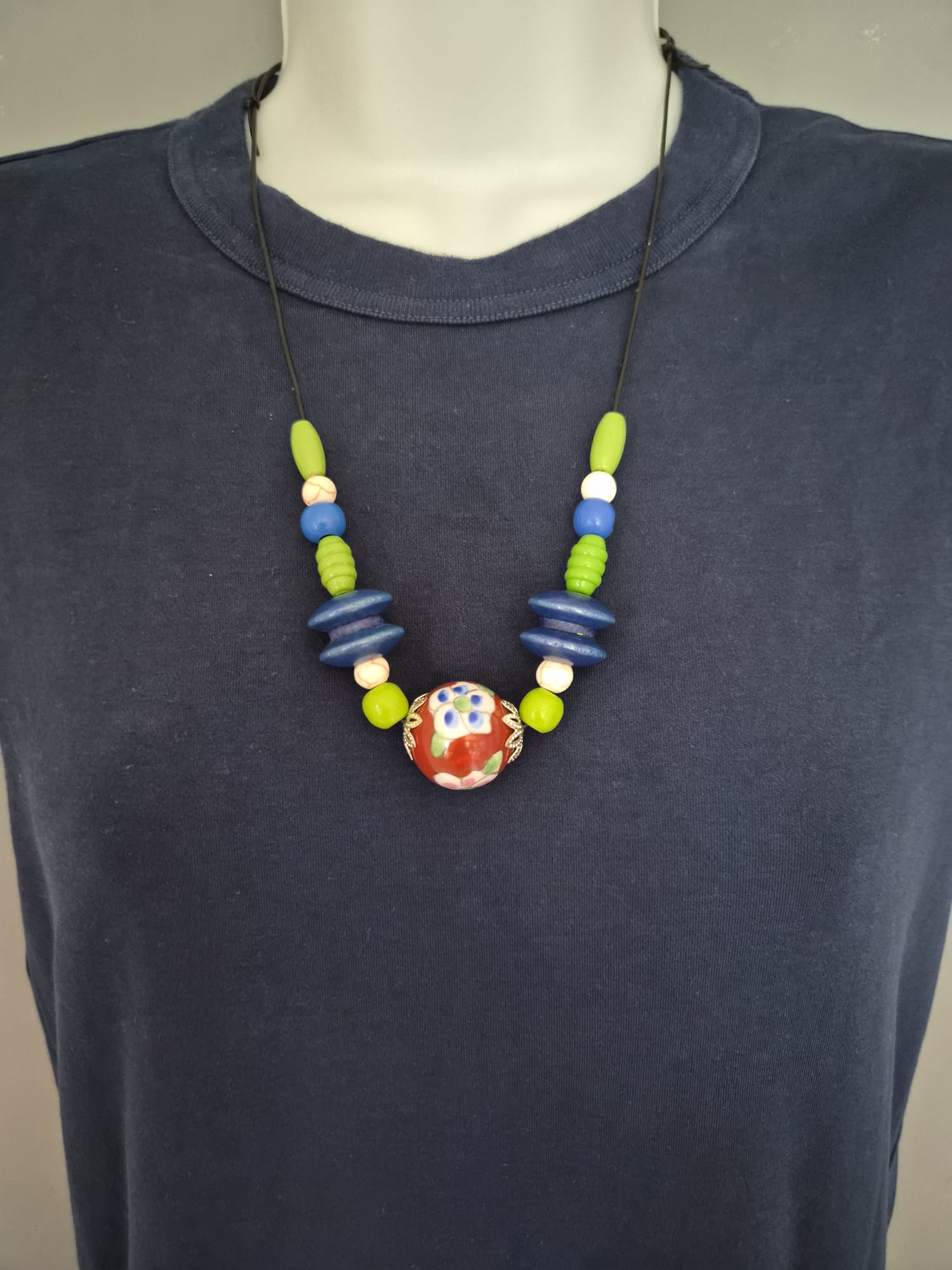 Wild Garden necklace worn on a mannequin